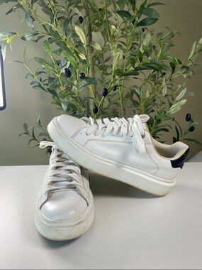 White Leather Low-Top Sneakers with Black Heel Accent